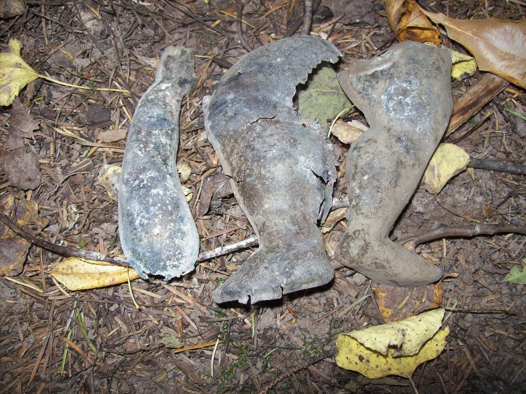 Metal doll parts found at the site